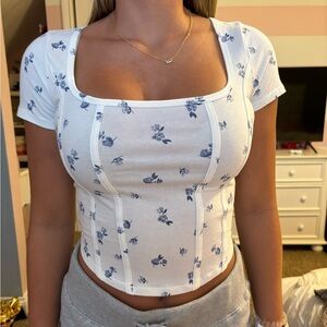 Cropped white top with flowers from Hollister